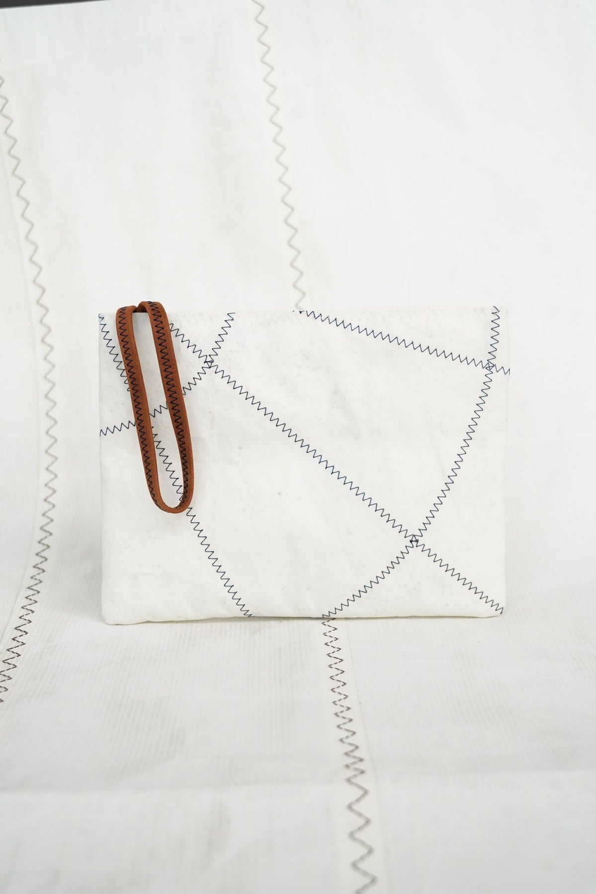 Pochette dragonne Belem · Cuir