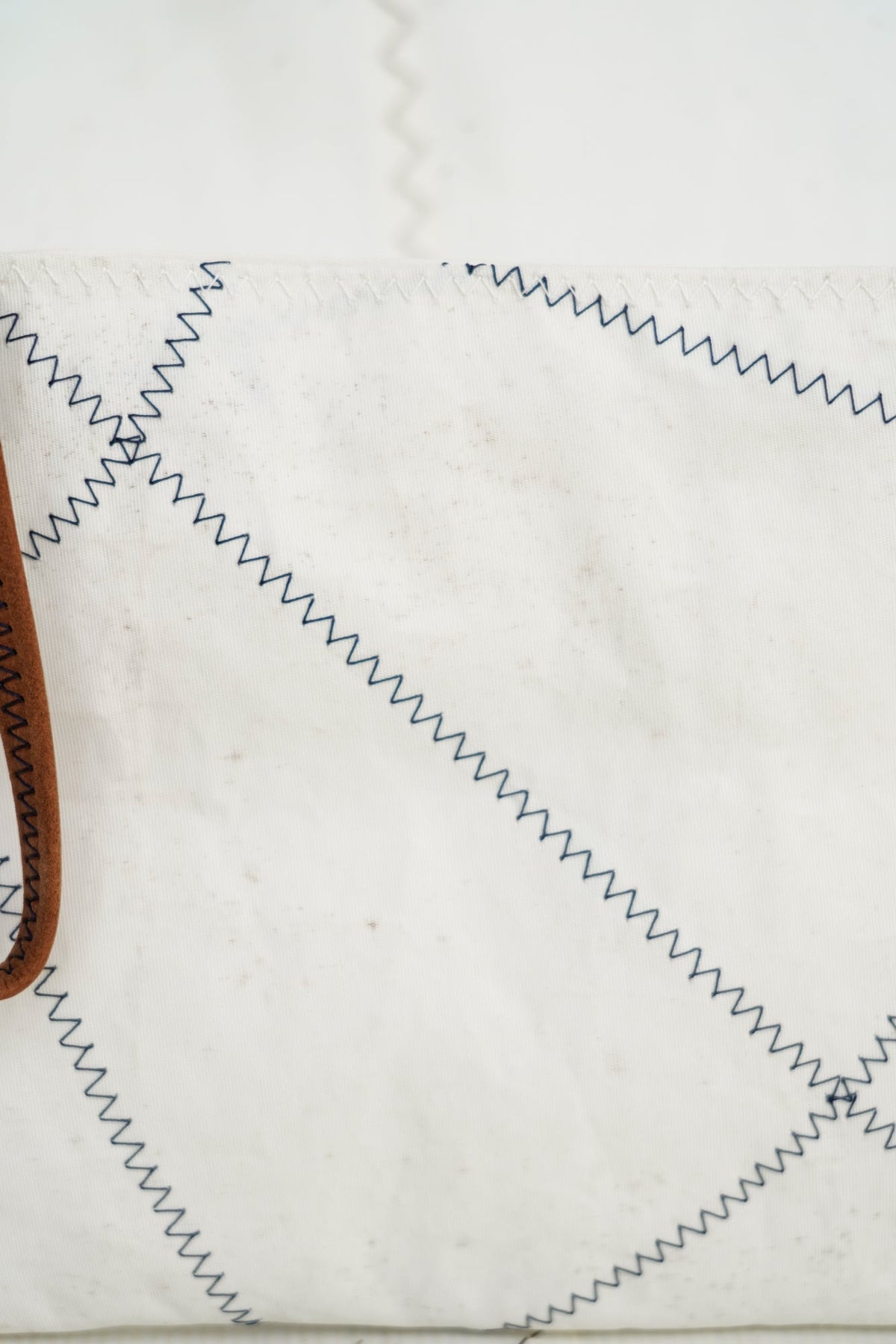 Pochette dragonne Belem · Cuir