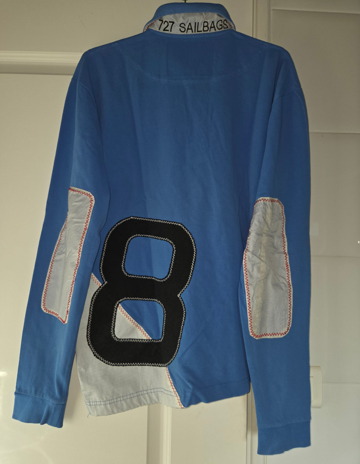 Polo bleu chiffre noir