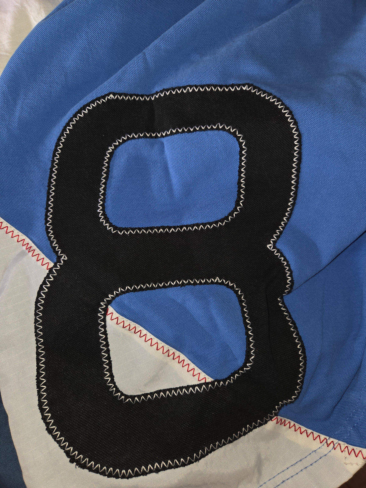 Polo bleu chiffre noir